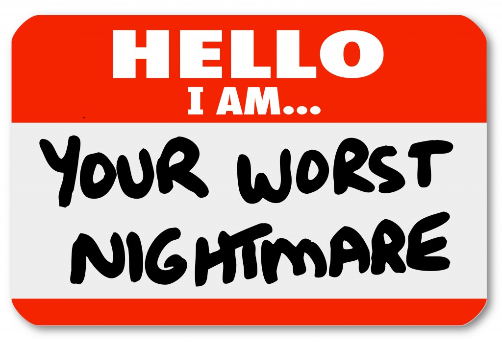 A blue nametag sticker with words Hello I Am Your Worst Nightmar